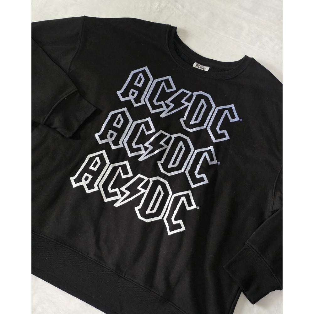 AC/DC womens size large 12-14 black crewneck pullover sweater repeated logo